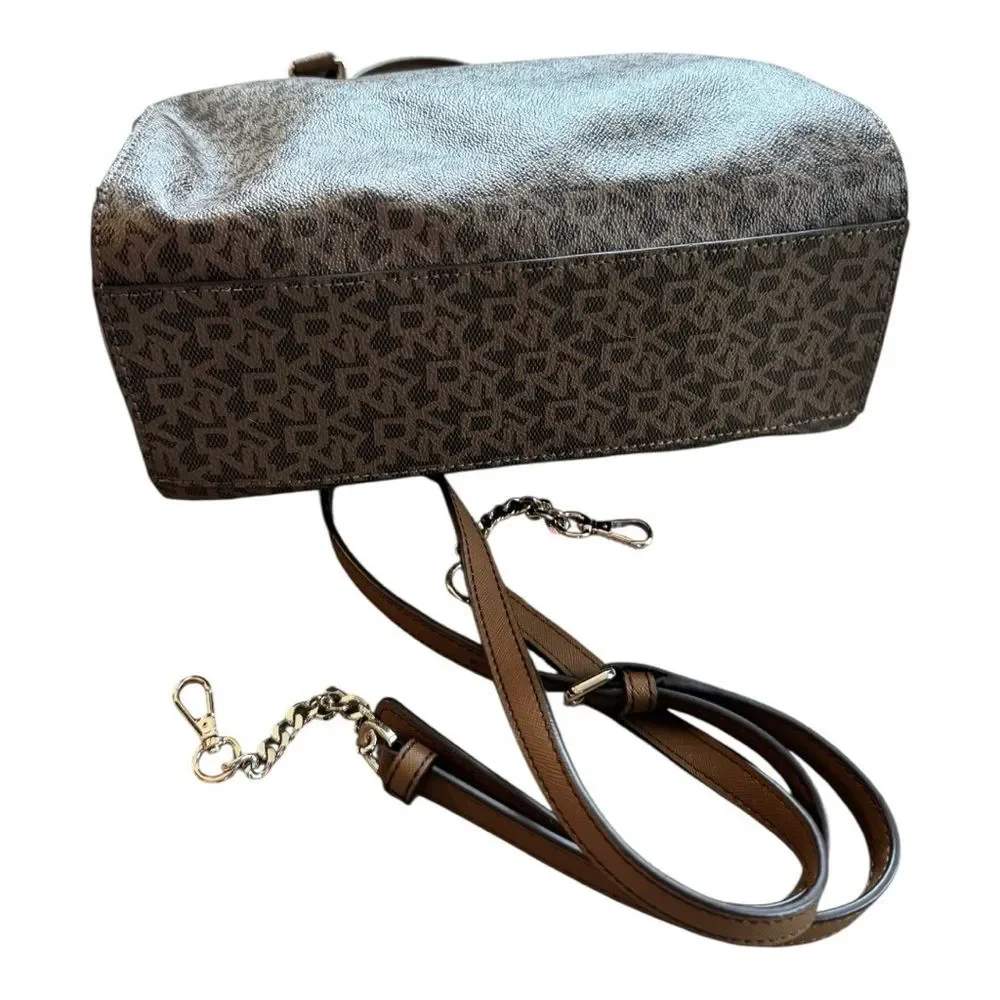 DKNY brown monogram bag is a DKNY Bryant Boston tote featuring an all-over logo